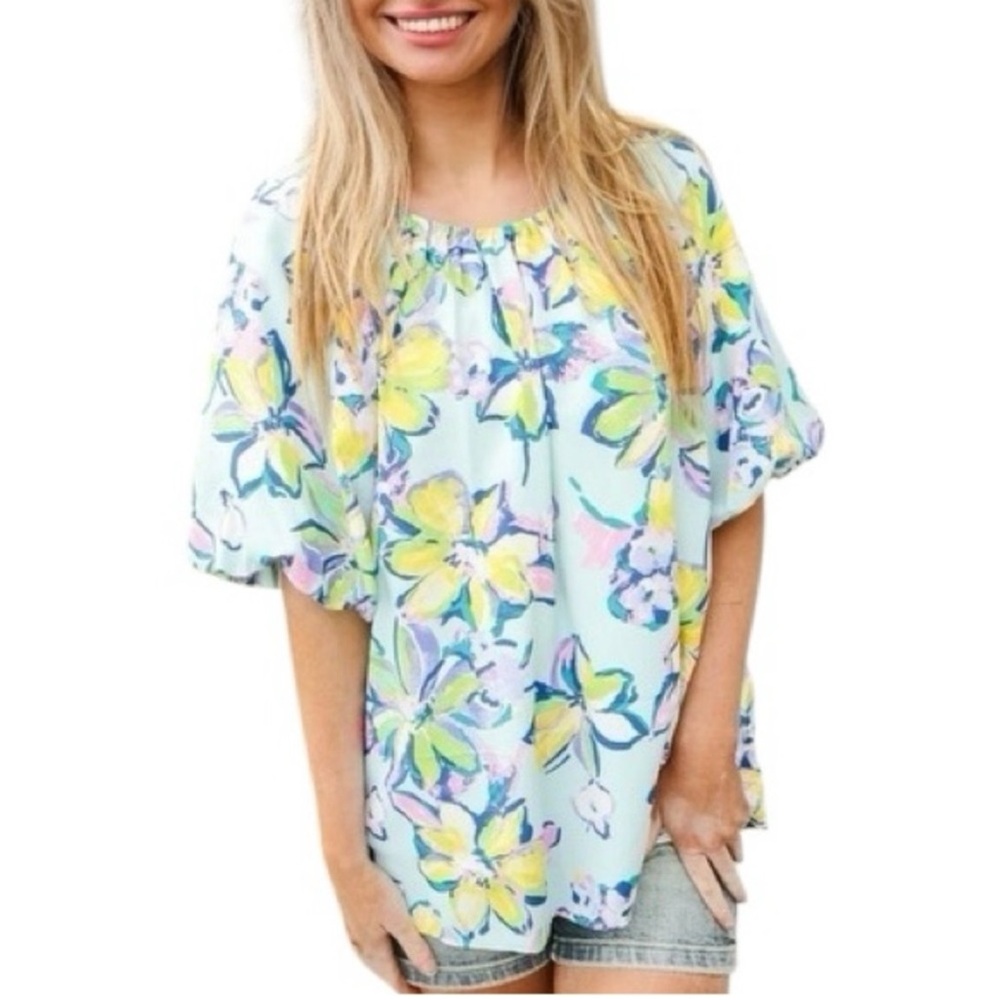 New First Love light blue floral top with elastic band neck shoulders & below